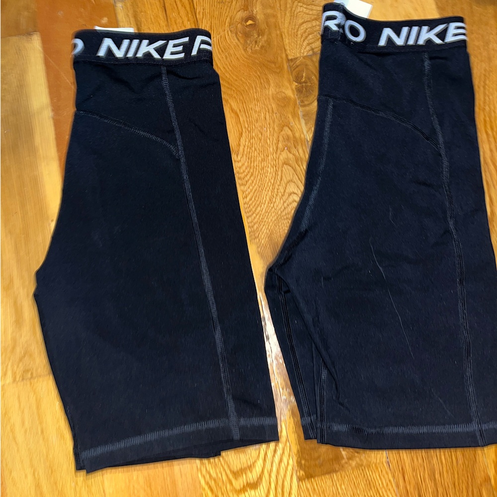 Two pairs of Women’s nike pro 5” shorts